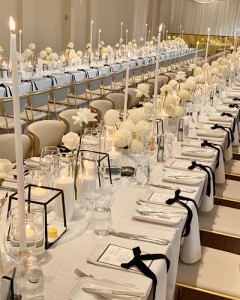 Guest table arrangements of Fresh white Disbuds and Roses. By Bloom Blessings Melbourne